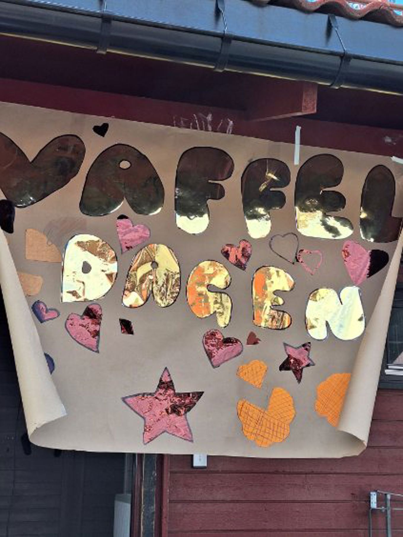 En plakat med ordet Vaffel på. 